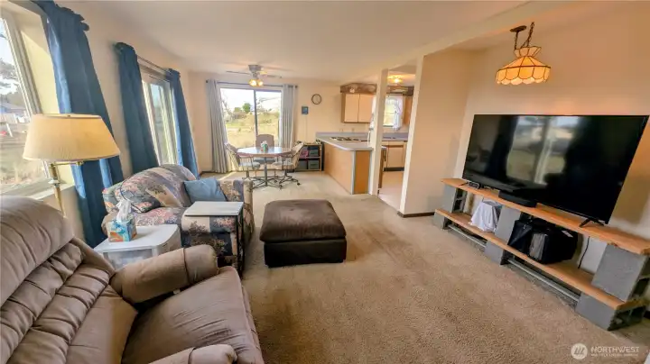 Open living concept provides easy access to the living, dining and kitchen.