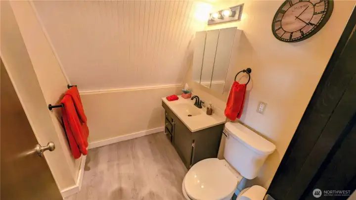Updated bathroom on second floor features a walk-in shower