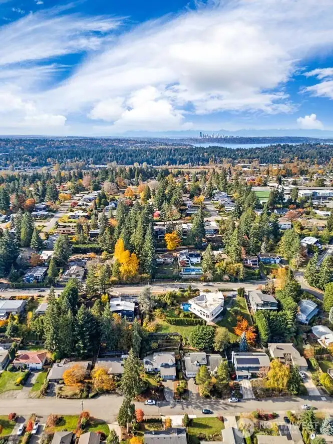 Looking west over building lot towards lakes and downtown Seattle