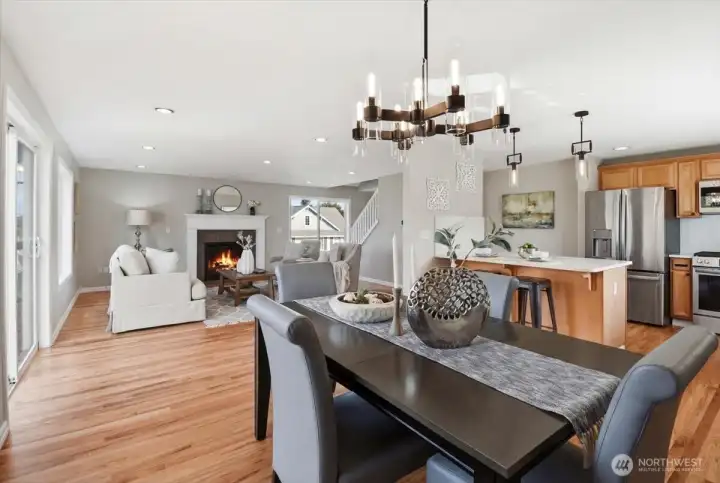 Great room flows over  elegant hardwoods. Air Conditioned thruout home!