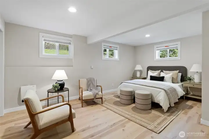 Primary bedroom in MIL apartment with ensuite full bath. Primary bedroom in MIL apartment with ensuite full bath.