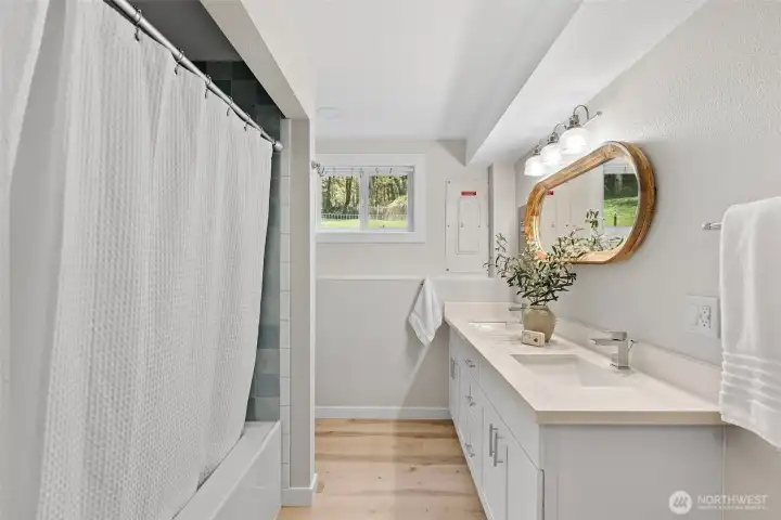 Primary bedroom bathroom with double vanity. Primary bedroom bathroom with double vanity.