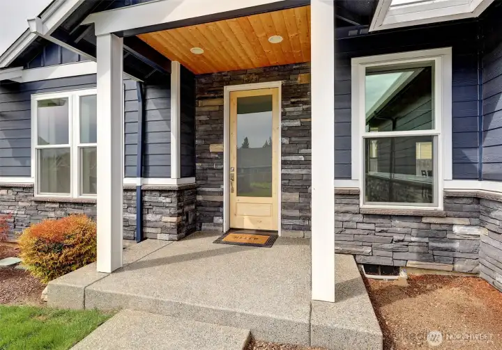 Covered porch, front door, glass