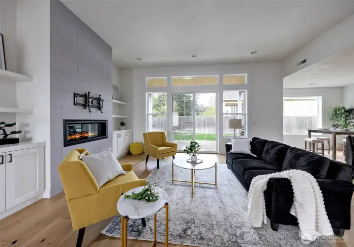 Great room, tile, gas fireplace, engineered hardwood floors, French doors to covered patio