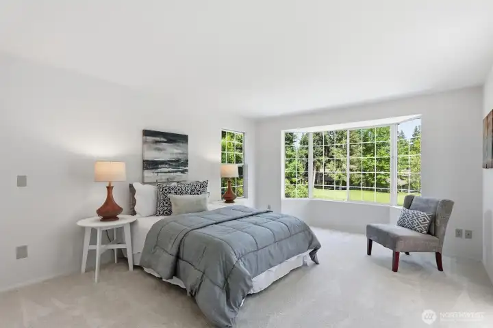 King sized primary suite with beautiful view