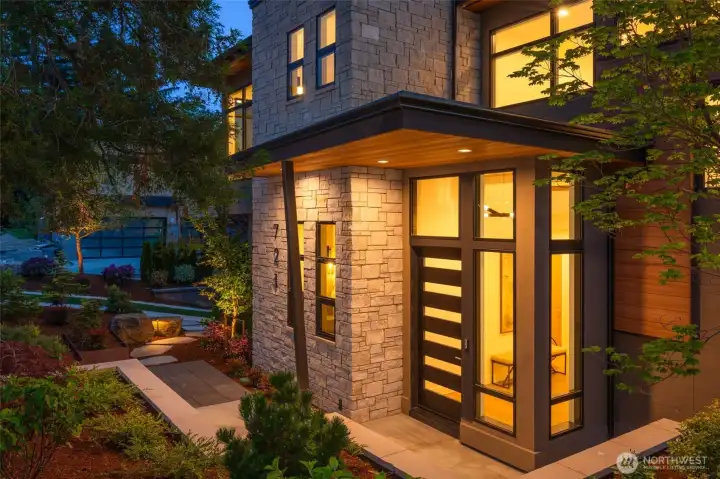 Stone and Cedar details perfectly frame your covered entry with style and sophistication