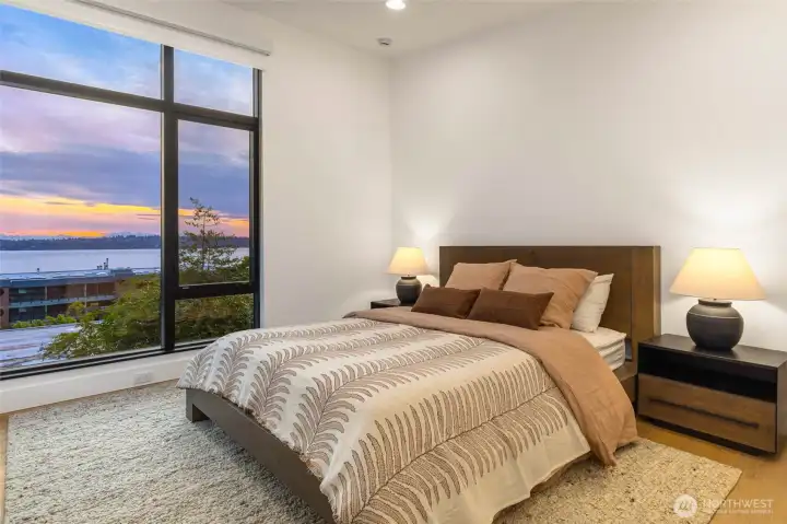 One of 3 Upper Floor Secondary Bedrooms, all featuring En Suite Baths. Entire Home features wide plank hardwood flooring