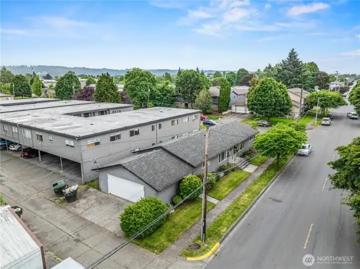 Aerial view of the duplex showcasing the layout and the convenient shared garage accessible right off the back alley.