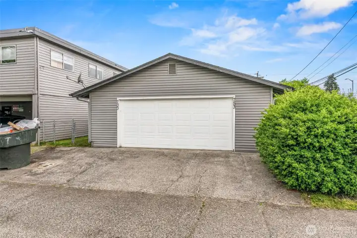 Excellent functionality! View of the shared garage, which includes separate, individual enclosed laundry rooms to provide extra privacy and convenience for residents