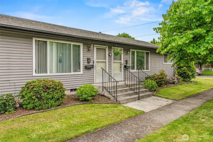A clear look at the front entry welcoming you into both beautifully updated units