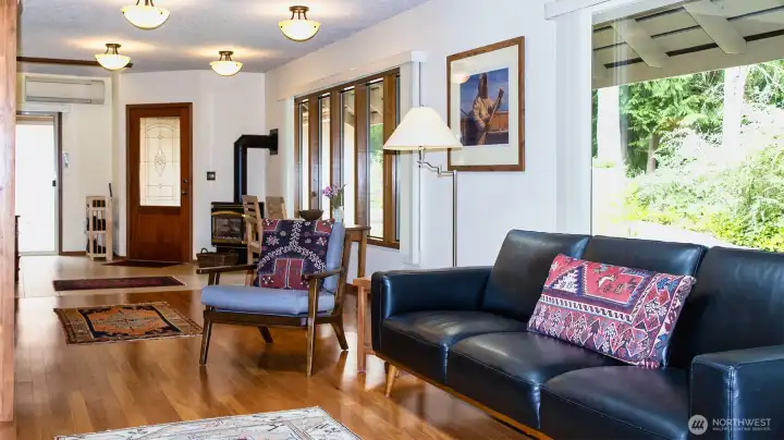 LR from mid-point to entry - engineered hardwood floors.