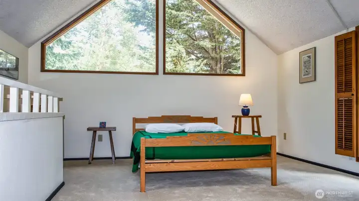 Loft - great space - louvered-door full windows to the right. Bathroom and closet area behind.