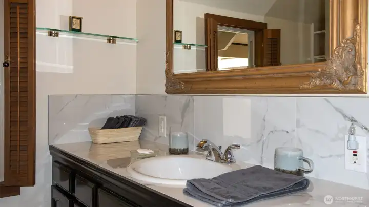 Three-quarter bath in loft.