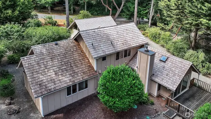 Recent high-grade western red cedar shake roof has been fire-treated and is gorgeous! The shake roof was appropriate due to the age of the home.