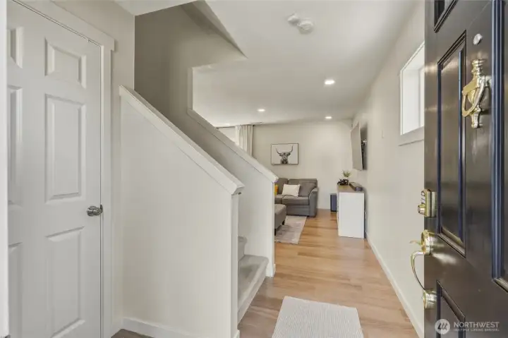 Open entry way with a coat closet Open entry way with a coat closet