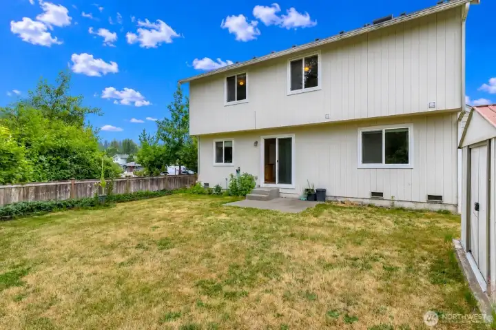 Fully fenced backyard with garden space Fully fenced backyard with garden space