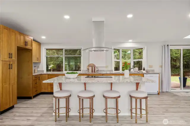 The large kitchen island allows people to gather