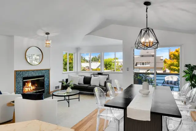 One of 2 huge living rooms on the middle floor, each with a gas fireplace, a dining area and a deck.