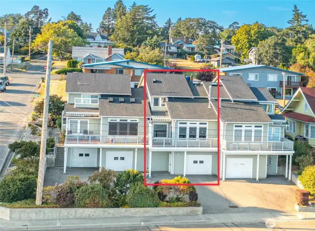 Unit 2 is the middle unit. The high quality construction means you do not hear the neighbors.