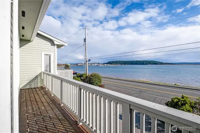 The deck extends the entire width of the unit.