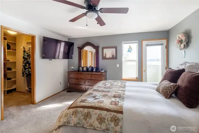 Enjoy the water views from the top floor while utilizing the walk-in closet.