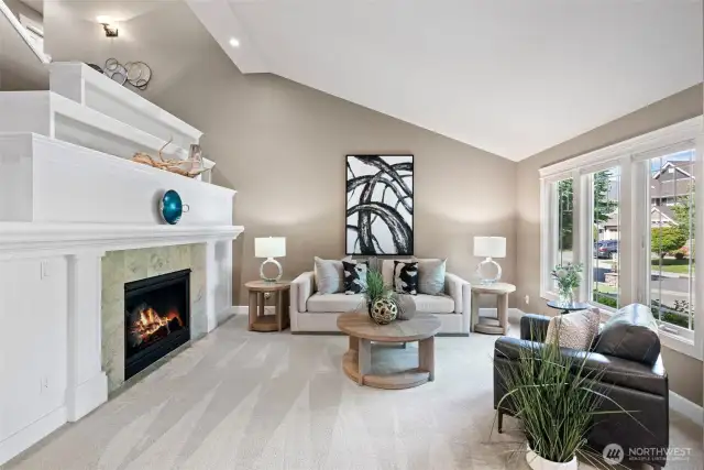 The foyer opens to the liviing room with a statement mantel piece for displaying art pieces or a favorite collection.