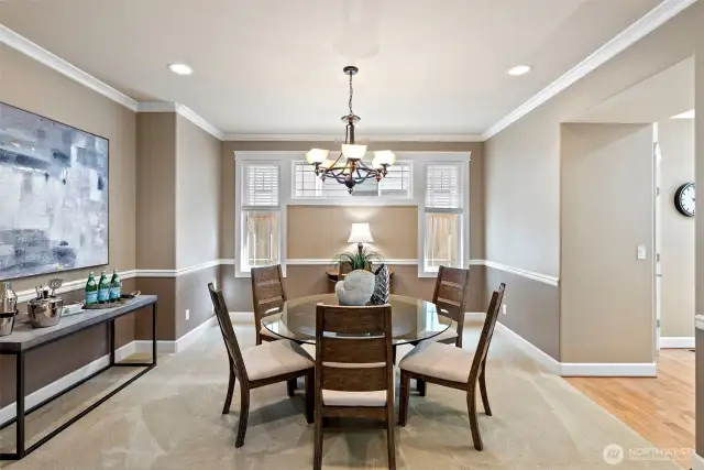 The dining room has a convenient passageway to the kitchen for easy entertaining.