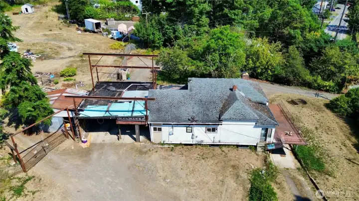 Main house with large carport.