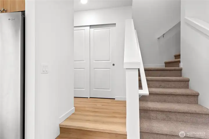 Pantry and powder room are located off the kitchen