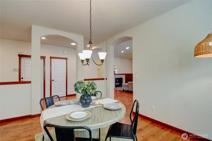 Spacious Dining Room just before the kitchen.  Beautiful hardwood floors.