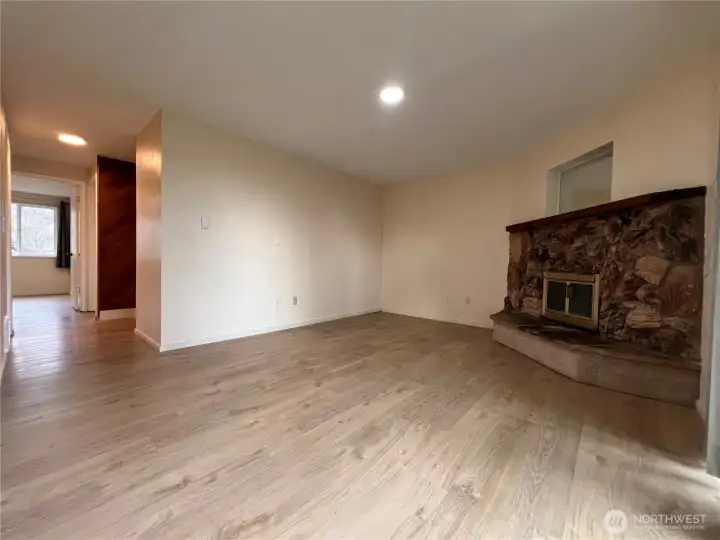 Spacious living space with cozy fire place