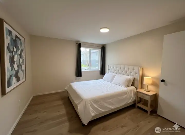 Virtually Staged Bedroom 1 with bathroom access