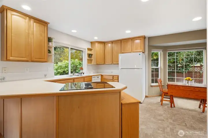 Functional kitchen with lovely garden views from each window.