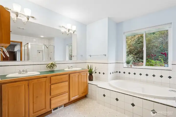 Primary suite offers a 5 piece bath.