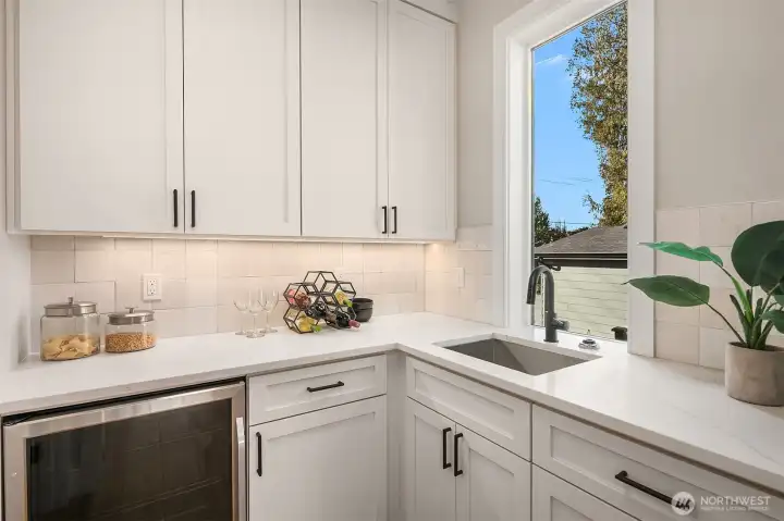 Butler Pantry. Photo is of our previous furnished Model Home in phase 1