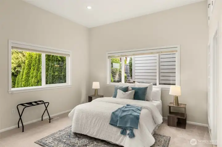 Main floor suite has it's own 3/4 bath, perfect for guests or multigenerational living