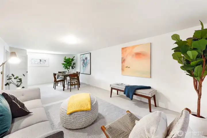 Lower level/basement spacious family room - perfect for media space, games/play and  guests.