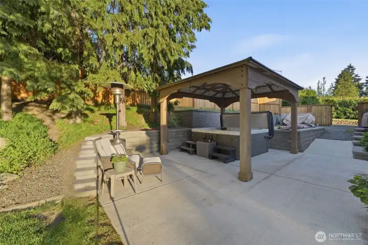 Gazebo and lots of extra space/parking behind it on side yard behind gate
