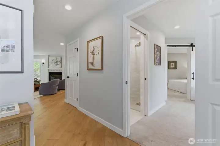 Main floor suite off the hallway is perfect for work from home or as guest room with den.