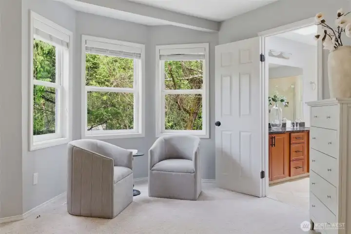 Primary suite overlooks beautiful retention pond.