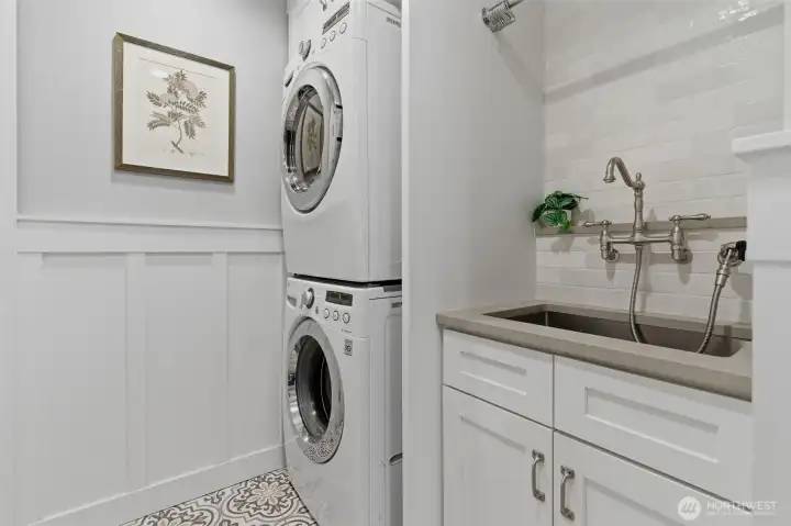 Main floor laundry room and utility sink.