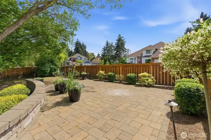 Extra patio space is perfect for raised garden beds or firepit.