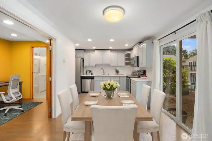 Virtually staged dining area and office.