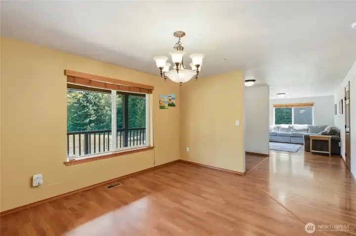 The dining room flows well into the living room and... The dining room flows well into the living room and...