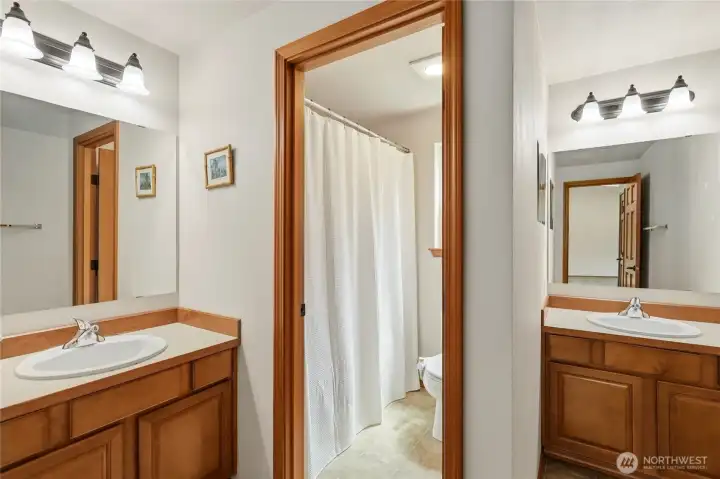 Upstairs full bath with separate vanities Upstairs full bath with separate vanities