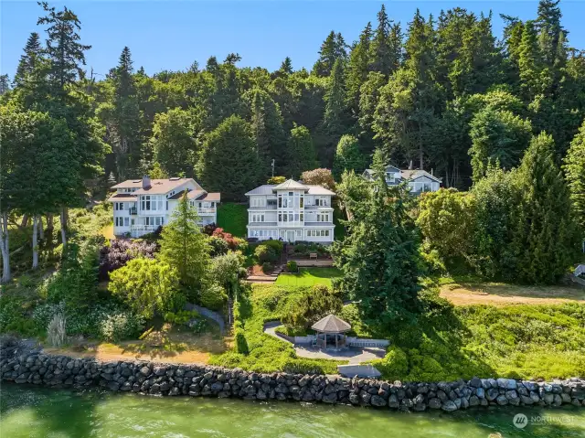 Welcome to stunning Washington Blvd. This majestic property offers breathtaking views, a beautifully terraced yard, and 77' of waterfront, complete with a private gazebo at the water's edge with water and power.