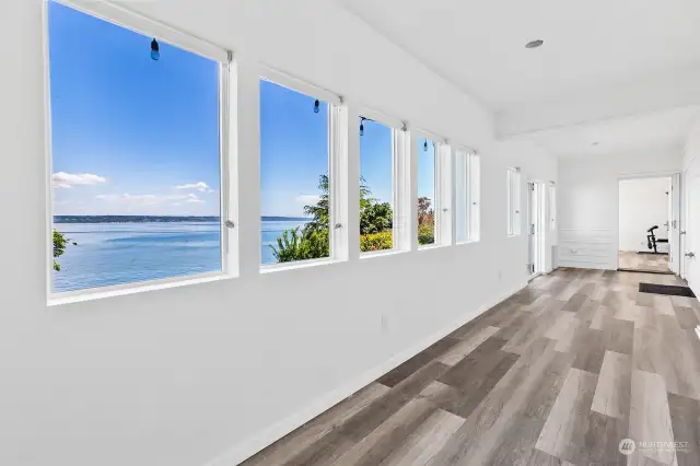 This sunroom area is the perfect spot for a wellness retreat. Add your cold plunge and sauna to round out a spa like experience at home!