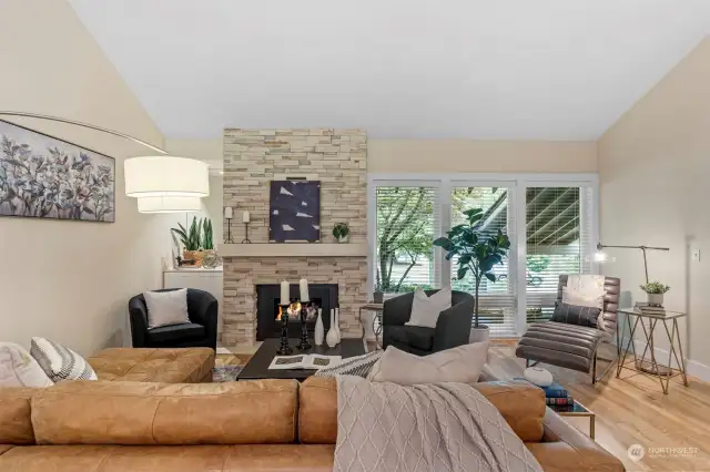 Living room with imported stone fireplace and mantel!