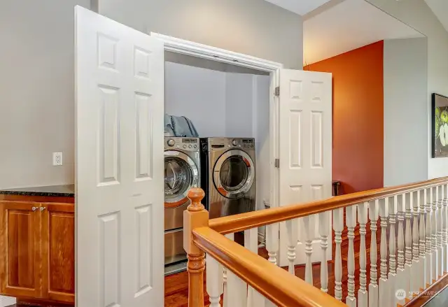 Upstairs Washer/Dryer Area. Banister To Downstairs.