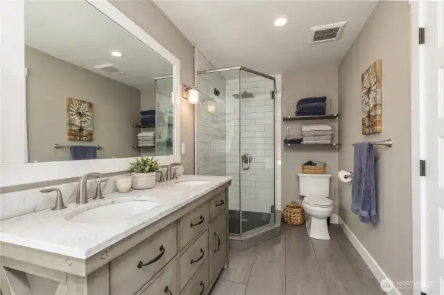 Heated tile floors and dual sinks in the primary bath